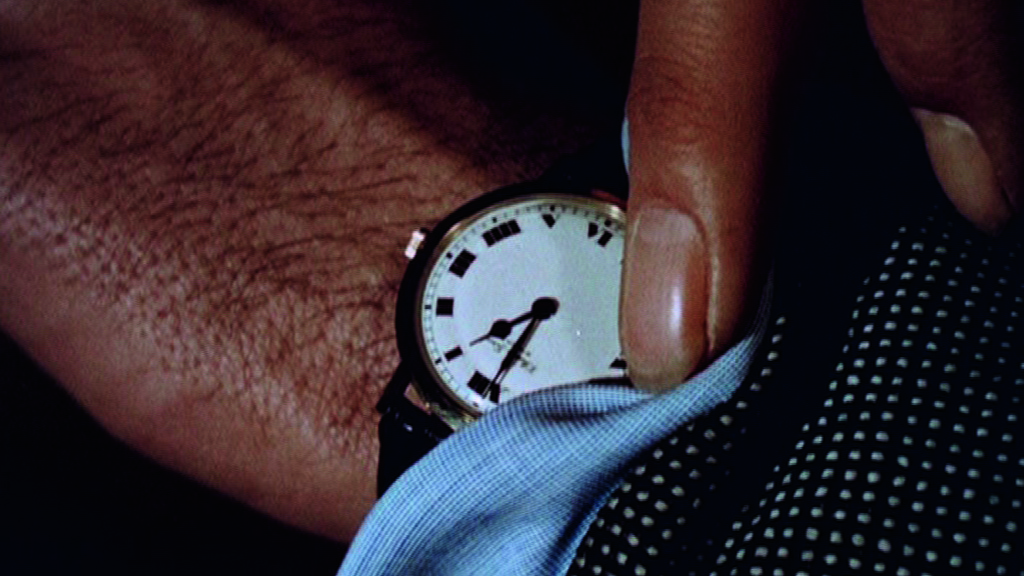 A wristwatch in a still from Christian Marclay’s video installation The Clock